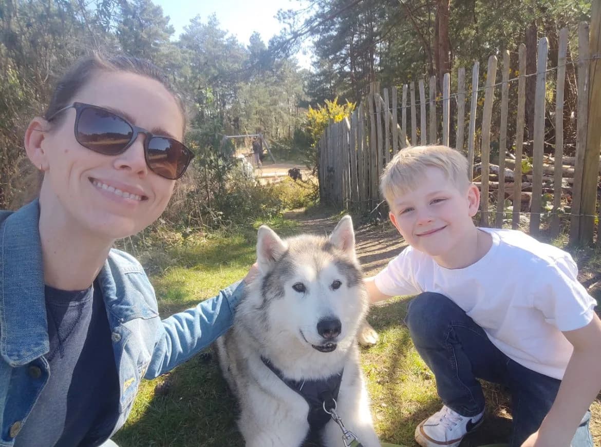 Olivia with family outdoors