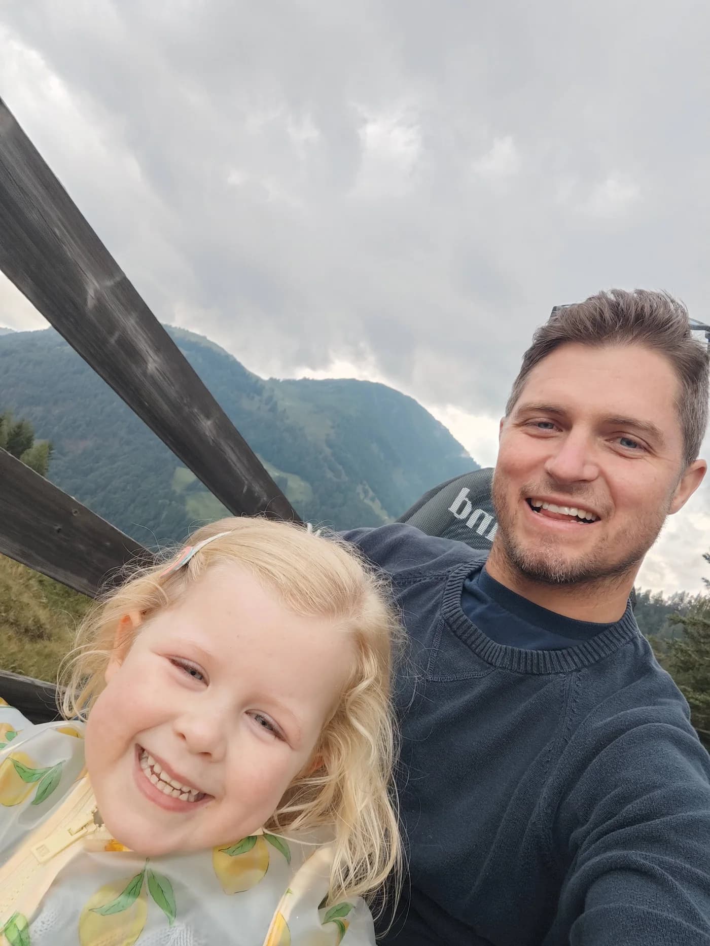 Tom with family outdoors